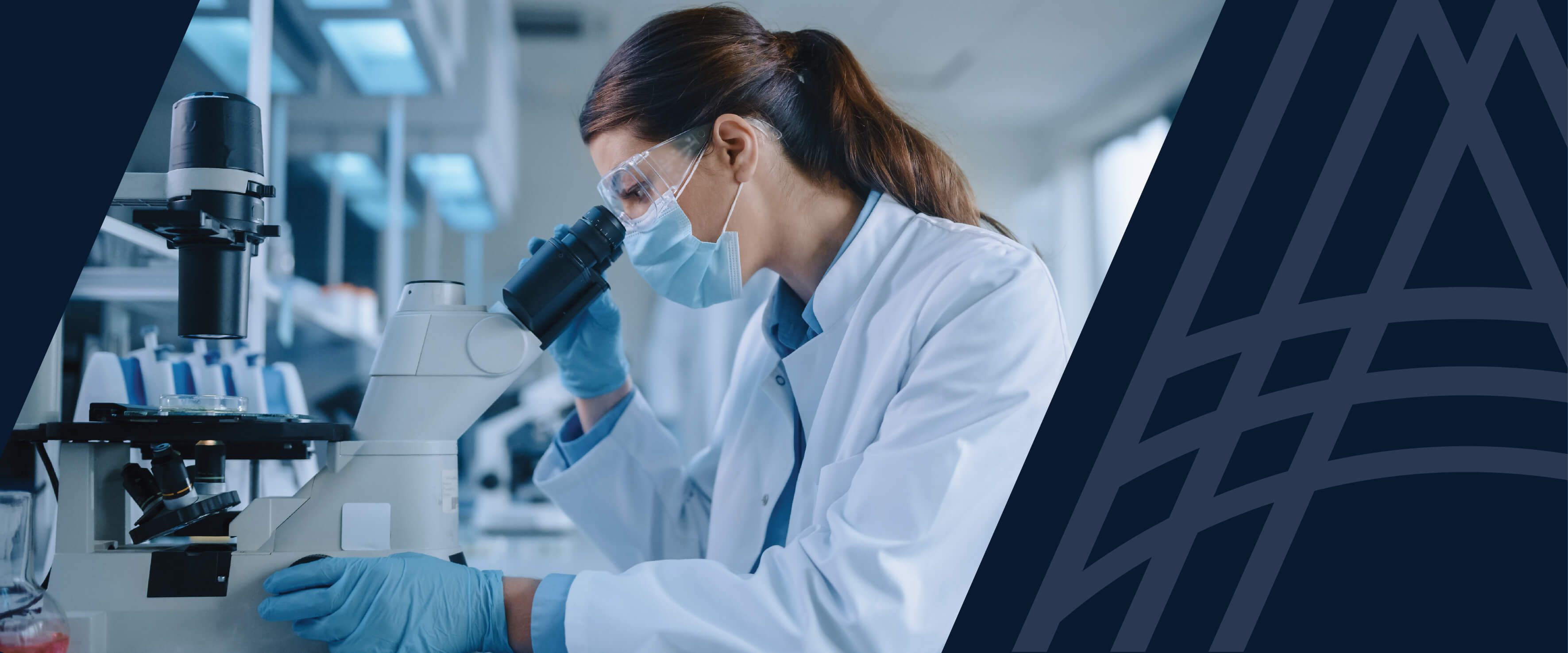 Clinical researcher using a microscope.