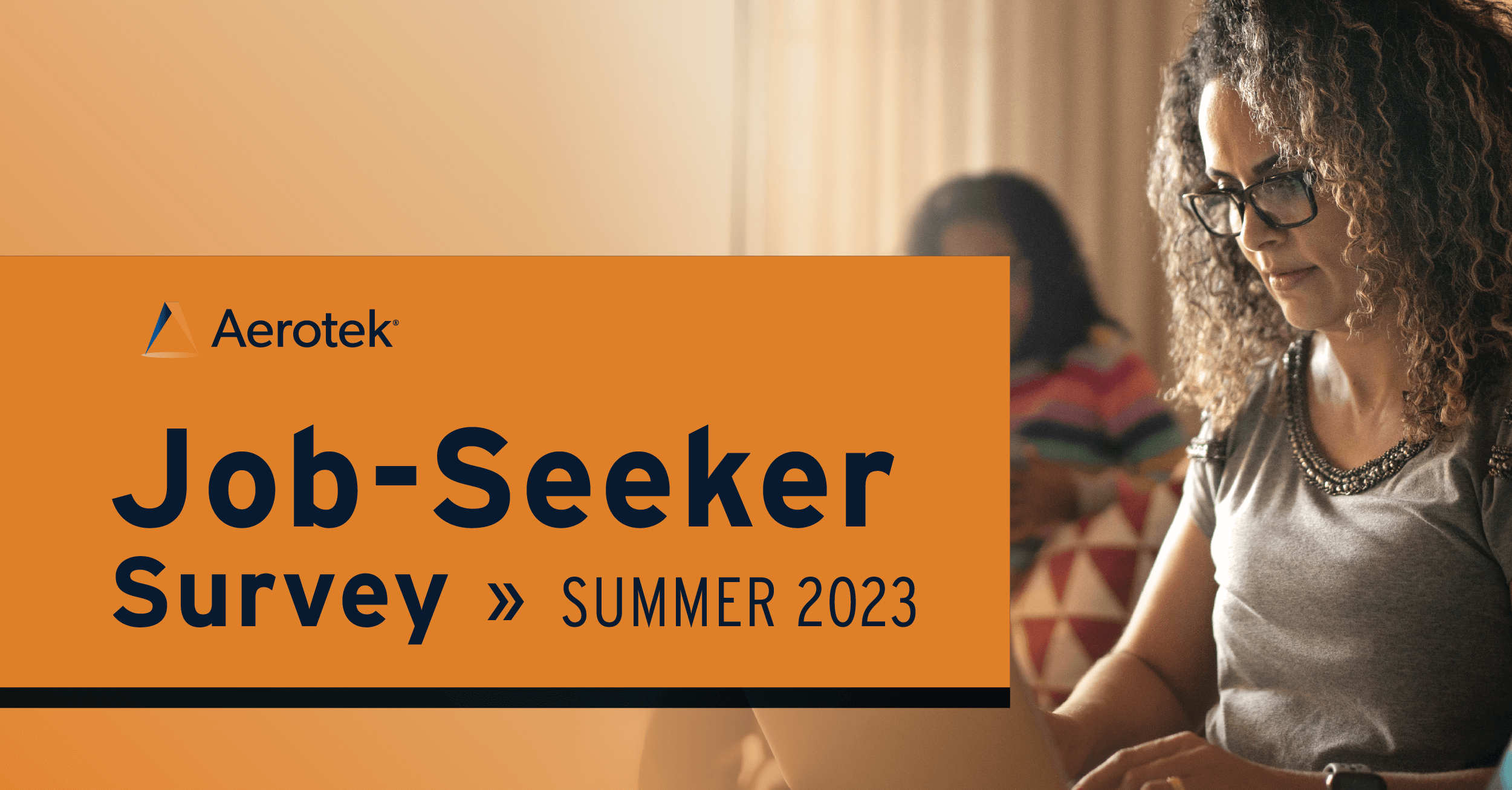 A woman in glasses looks at a screen and the words Job-Seeker Survey Summer 2023 are highlighted