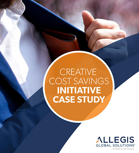 Man Wearing a Blue Blazer, While Putting His Wallet in His Blazer Pocket - For Creative Cost Savings Initiative Case Study.