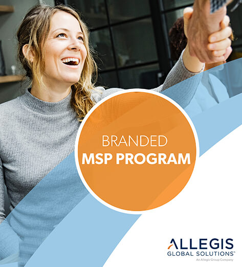 A Woman Smiling and Shaking Hands with Another Person - For Branded MSP Program.