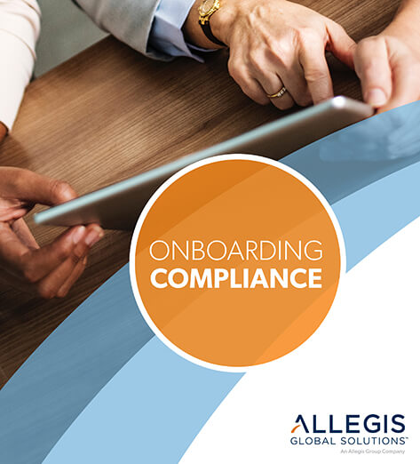 Two Hands on a Tablet Device - For Onboarding Compliance. 