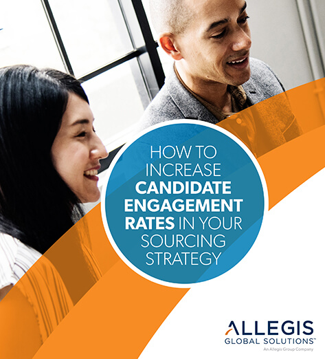 Two Professionals Smiling - For How To Increase Candidate Engagement Rates In Your Sourcing Strategy