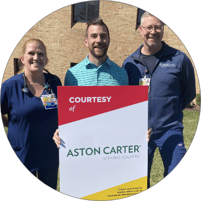 Employees volunteer at an event at a hospital 