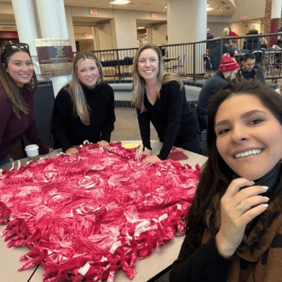 Four Aston Carter employees volunteering.