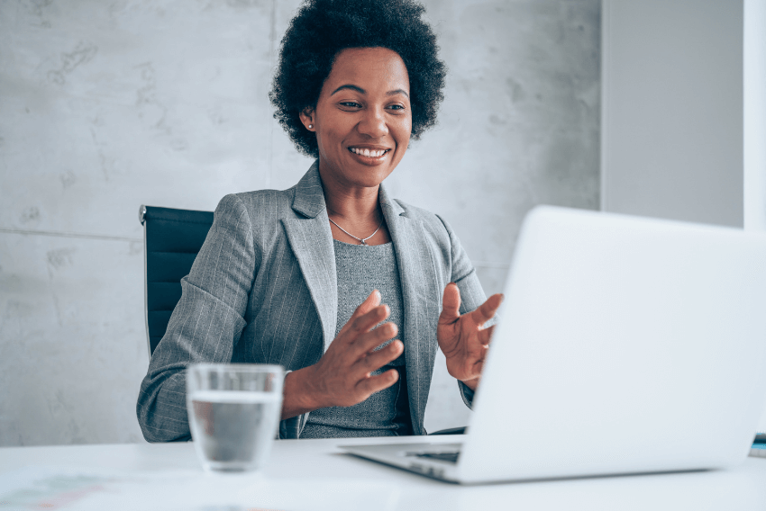 Hiring manager communicating with a candidate in a virtual interview.