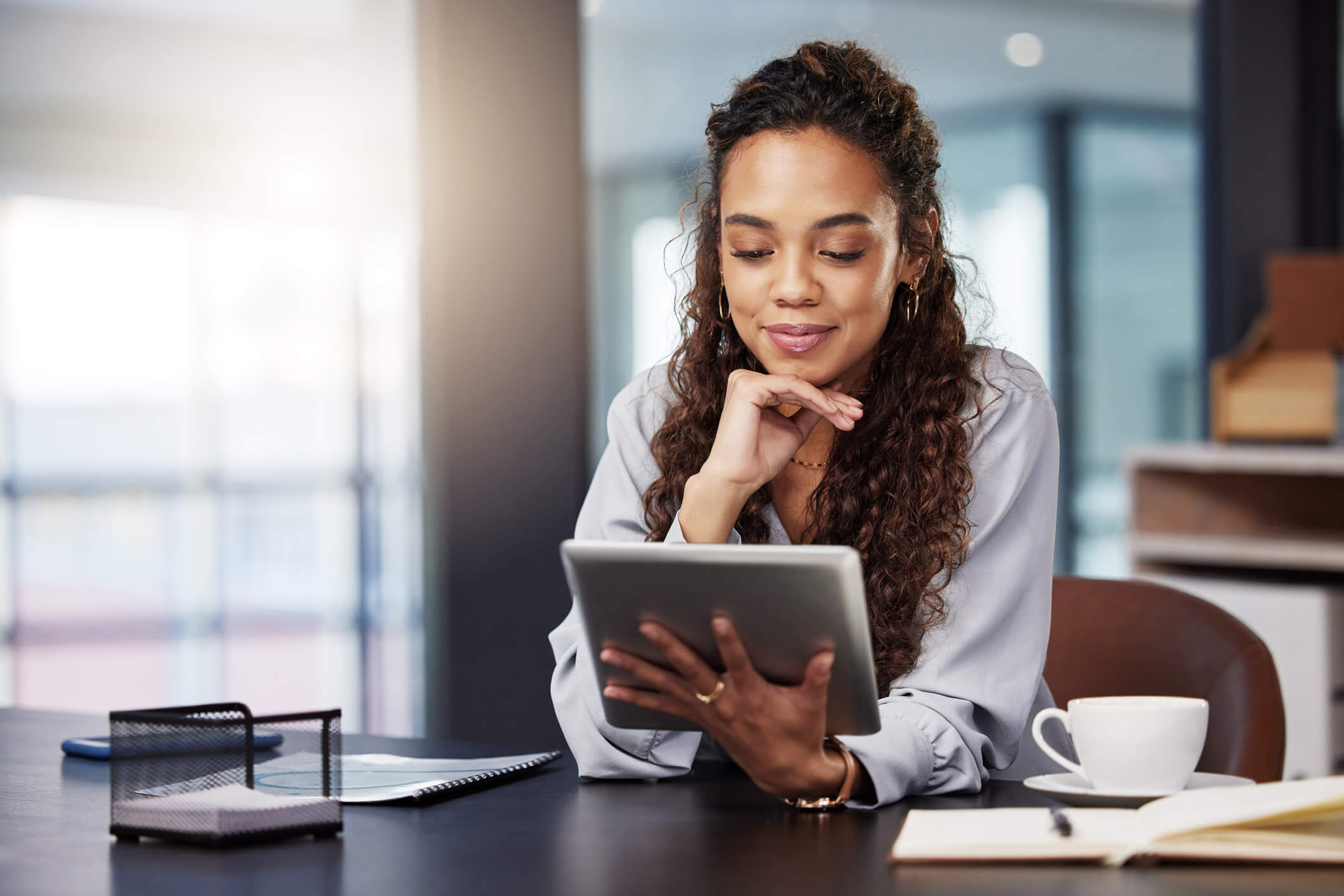A woman creating a personal brand on her linkedIn account.