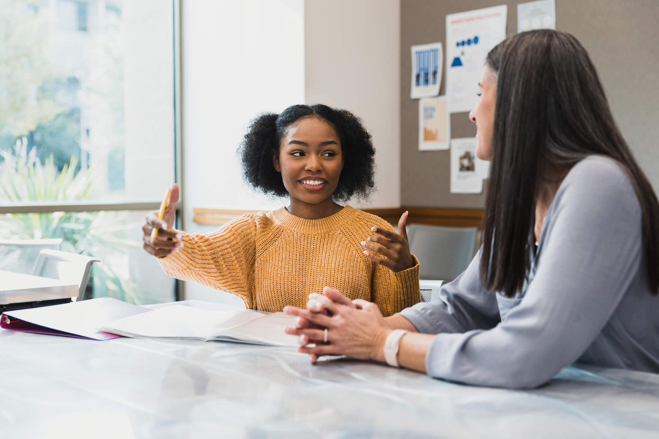 Two women discussing transferable skills that employers look for.