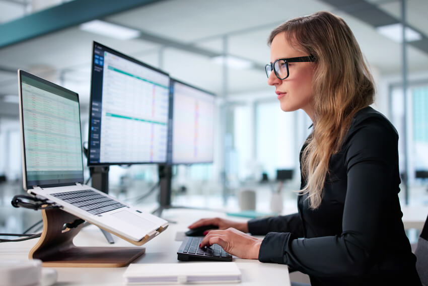 Female professional learning how shared services centers can help the CPA shortage.