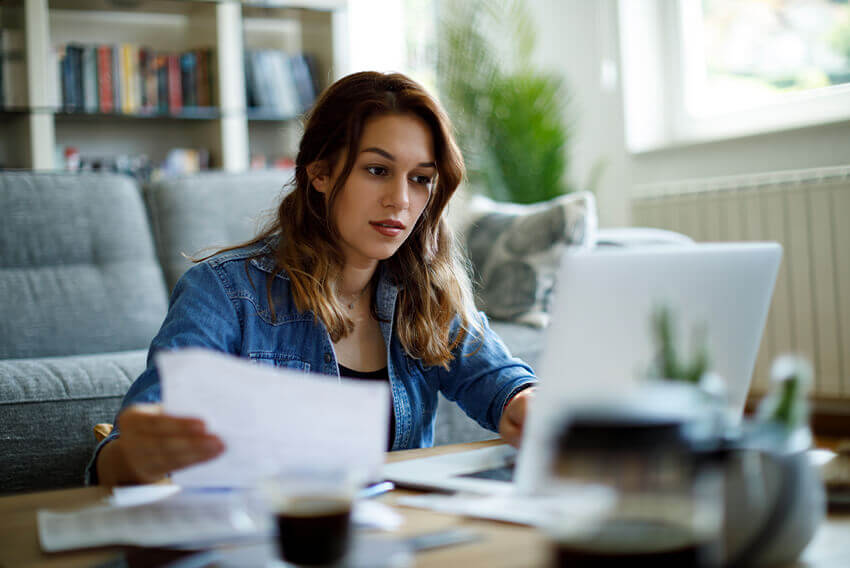 Female accountant upskilling her hard and soft skills while looking for an accounting job.