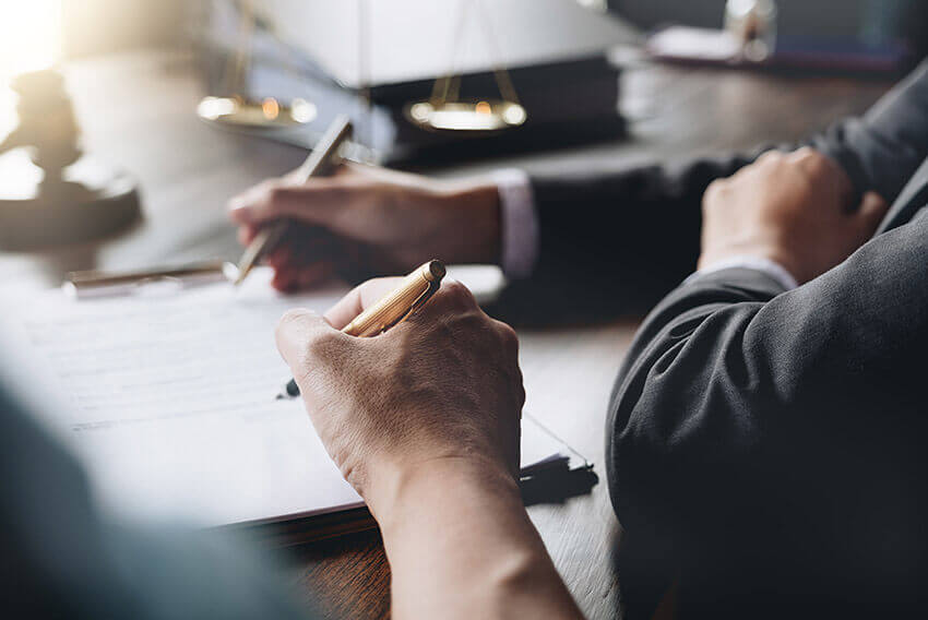 Professional hands with pens while collaborating. 