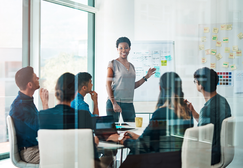 Black woman leads a presentation