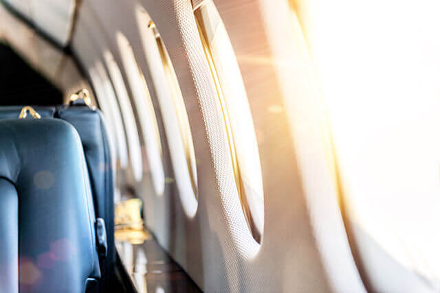View of inside of airplane along the windows