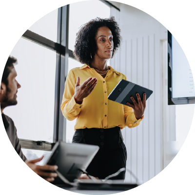 Woman in conference room on a tablet
