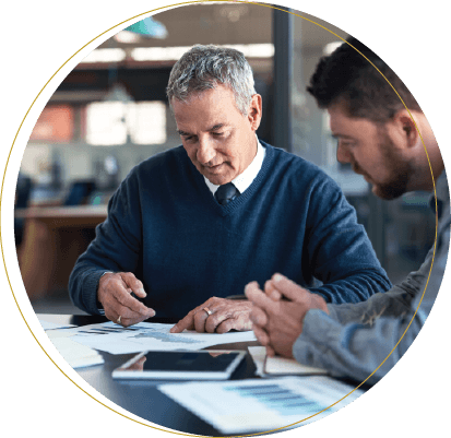 Male staffing partner working with a client to find the best staffing solution to fit his company's needs.