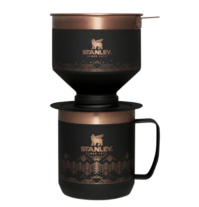 A black and copper colored Stanley brand pour-over coffee set